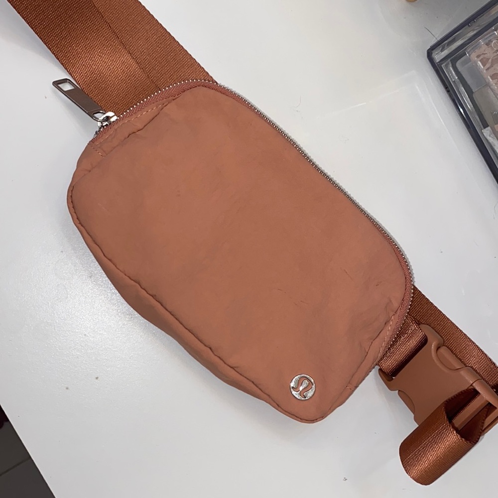 Pink Lululemon belt bag